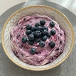 creamy blueberry cheesecake dip with fresh blueberries