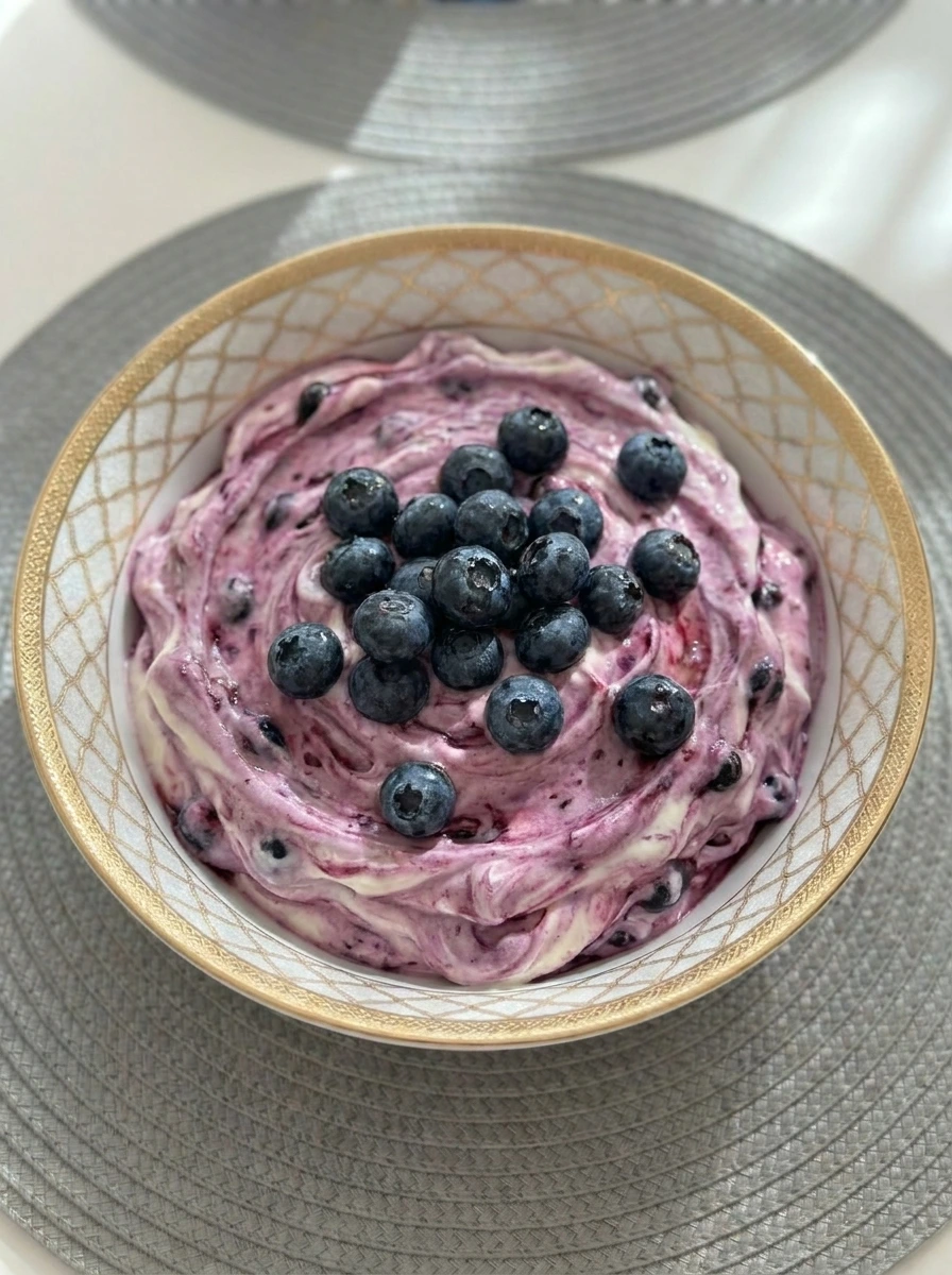 creamy blueberry cheesecake dip with fresh blueberries