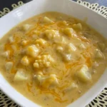 creamy cheddar garlic potato soup bowl