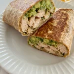 Chicken Avocado Wrap sliced showing creamy avocado and juicy chicken