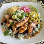 Chicken Taco Bowl with rice beans corn and toppings