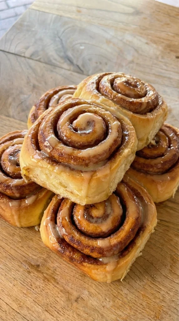 Cookies and Cream Cinnamon Rolls plated with glaze
