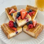 Easy Memorial Day Berry Cheesecake Bars with fresh berries