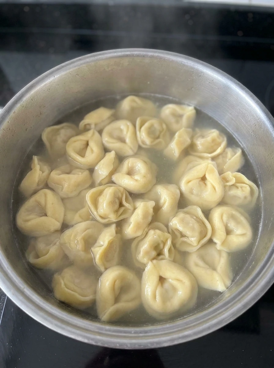 Cooked tortellini soft and plump