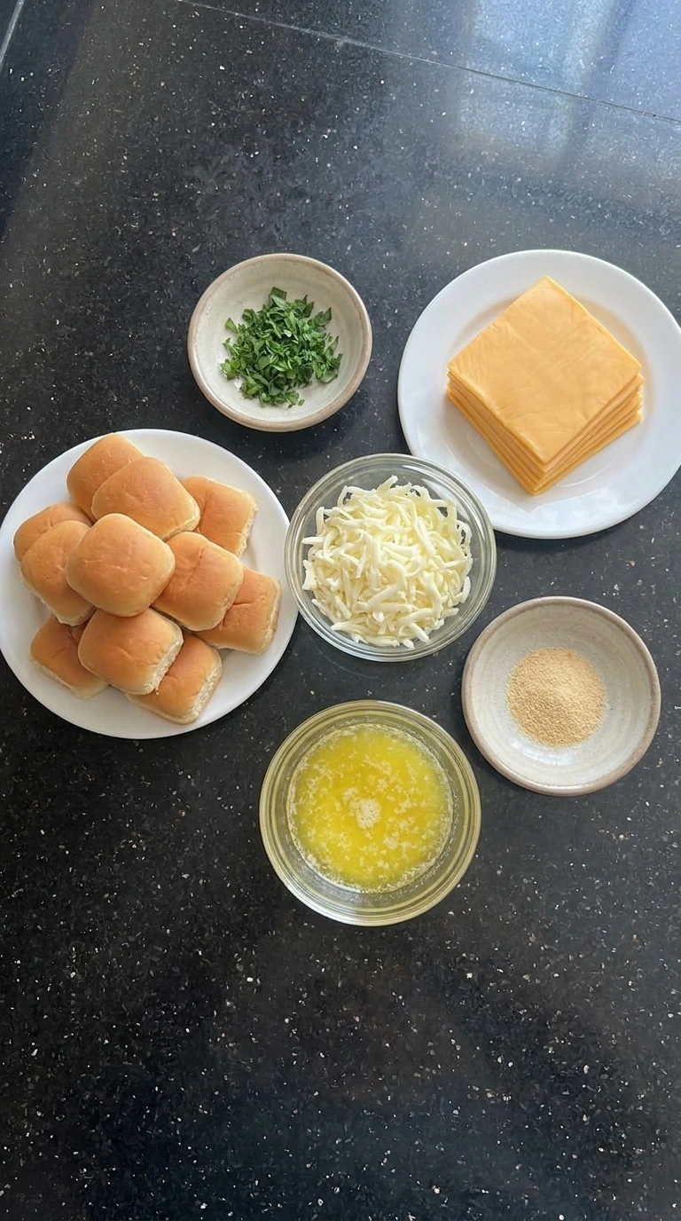 ingredients for mini grilled cheese sliders in separate bowls