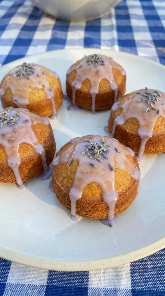 mini lemon cakes with lavender glaze on plate