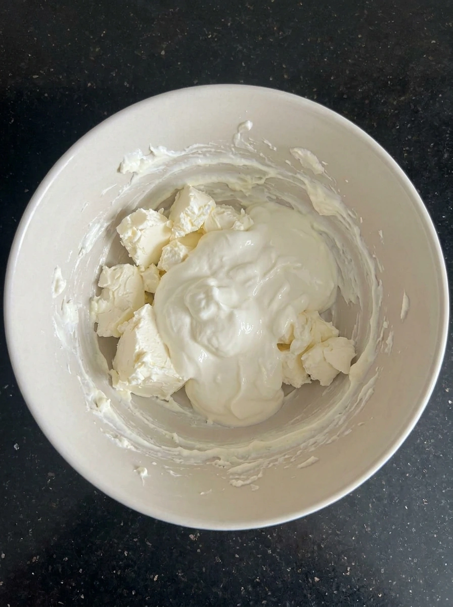 Cream cheese and sour cream mixed together