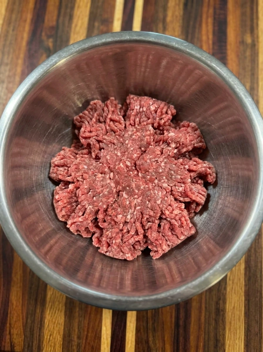 Mixing meatball ingredients
