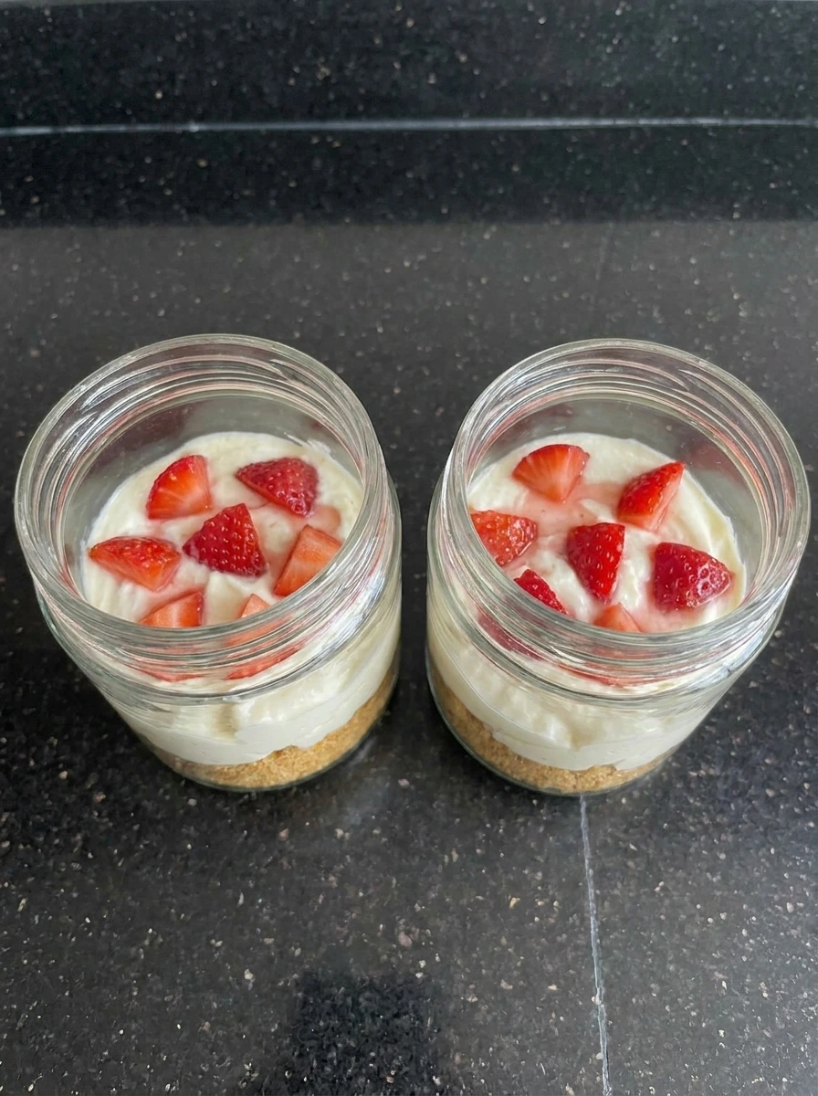 strawberries on cheesecake layer
