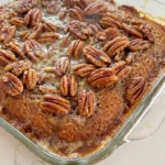 Pecan Pie Dump Cake golden top with pecans