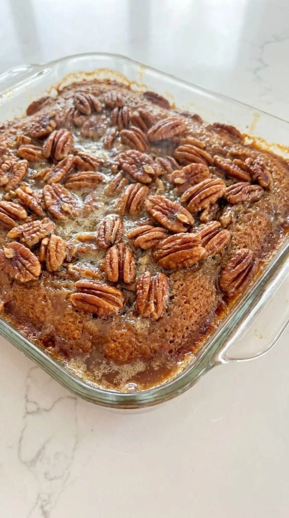 Pecan Pie Dump Cake golden top with pecans