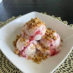 Rhubarb Crisp Ice Cream creamy scoops with crisp topping