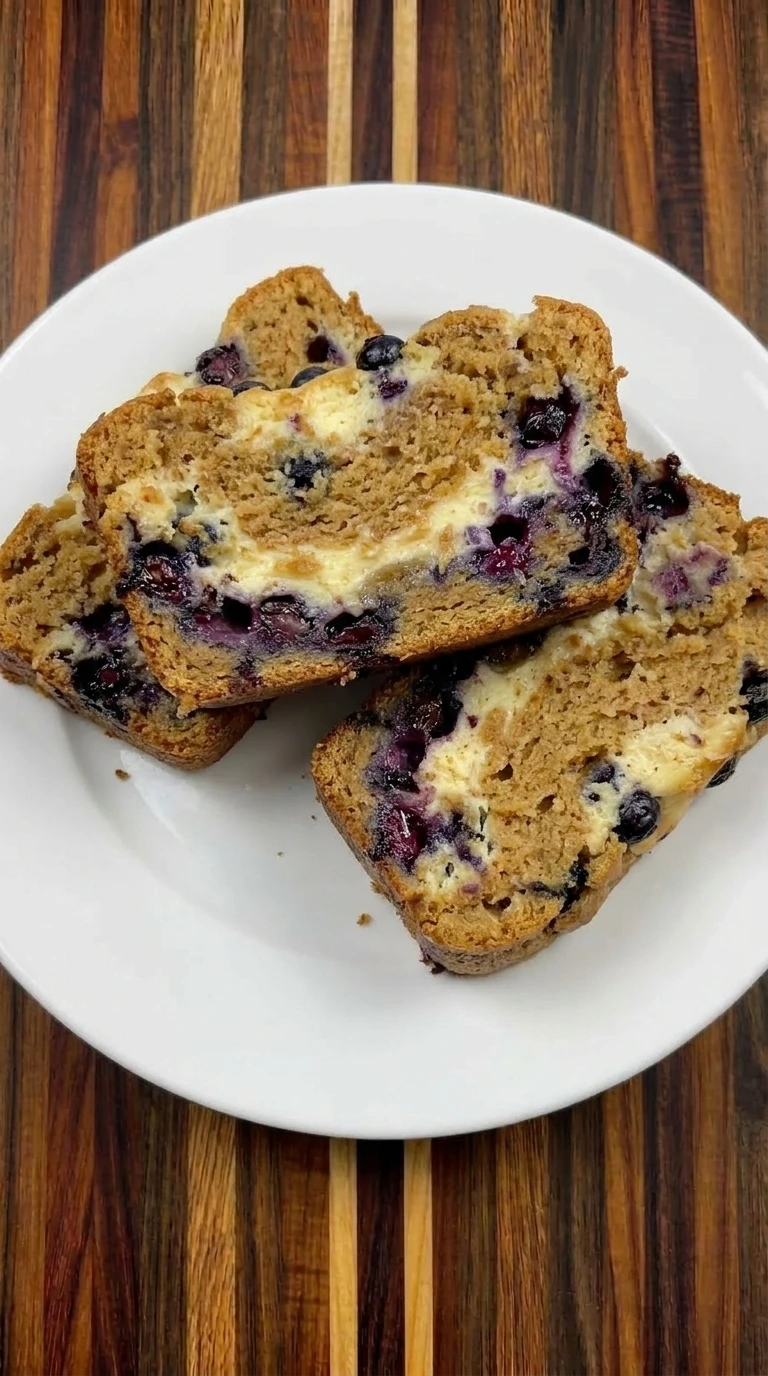 Sliced blueberry cream cheese bread