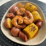 Slow Cooker Shrimp Boil with shrimp corn potatoes and sausage