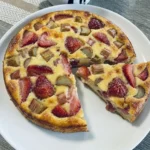Strawberry Rhubarb Custard Pie baked with creamy filling