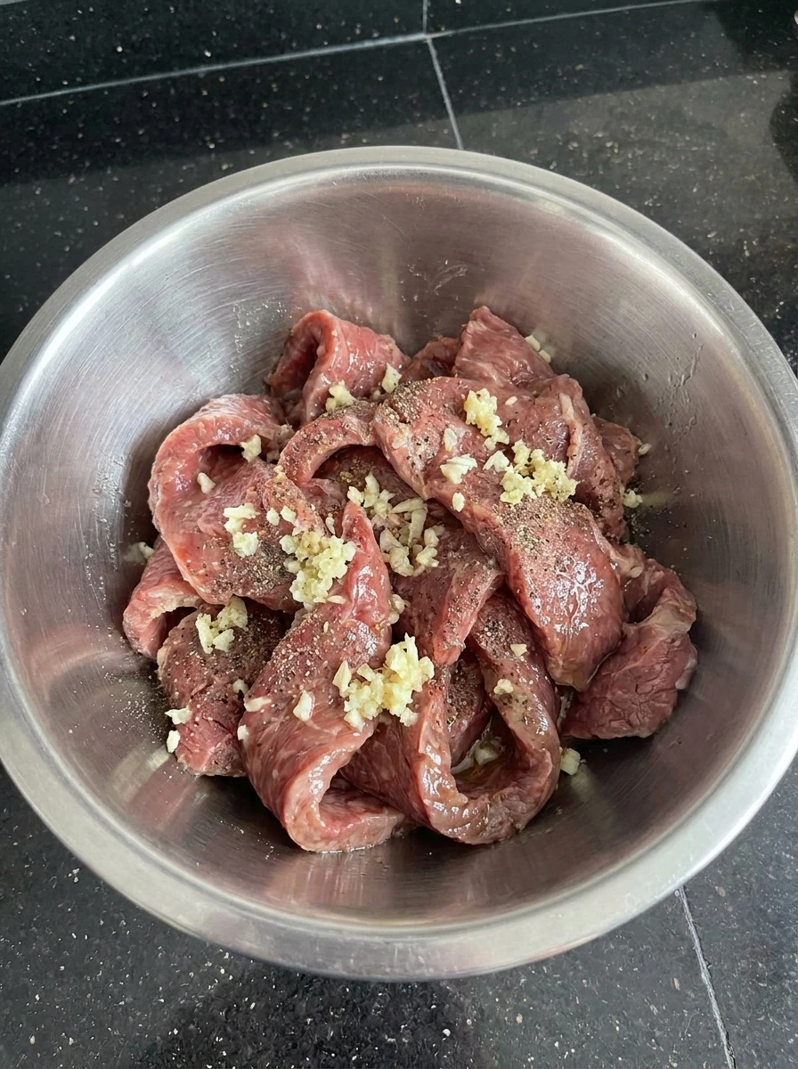 Seasoned beef strips coated with garlic and pepper