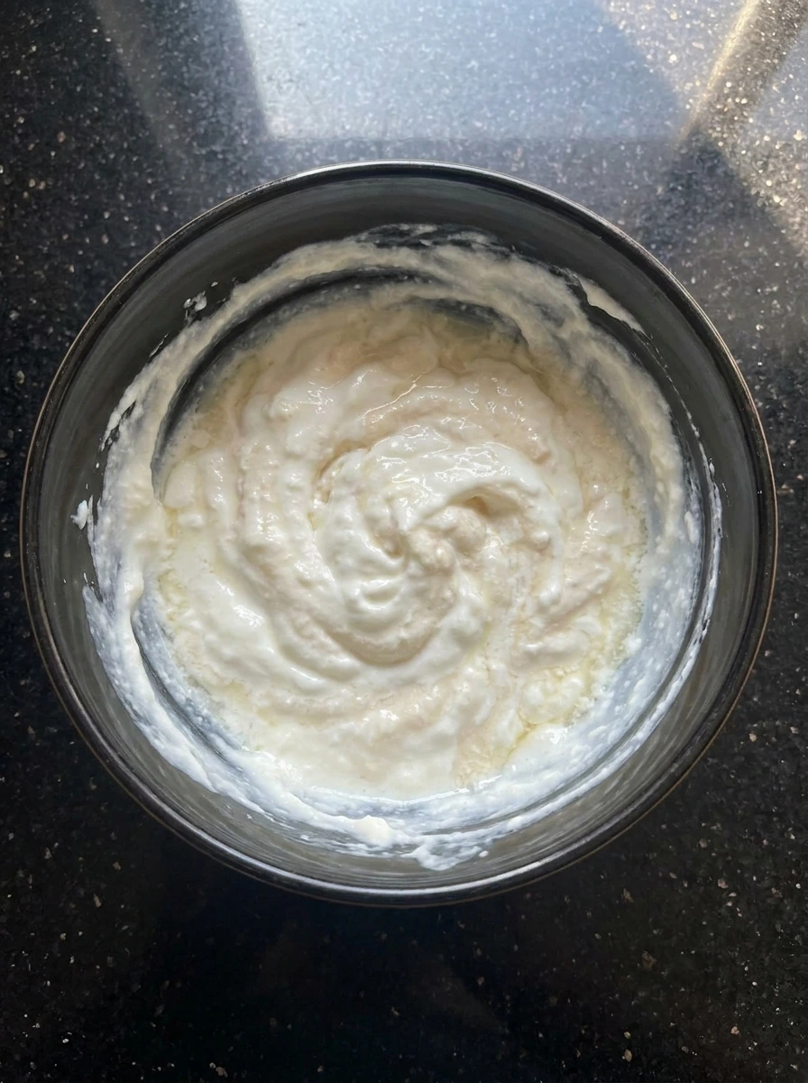 Mixing yogurt with honey and vanilla