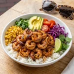 Grilled Shrimp Bowl with rice avocado corn and tomatoes