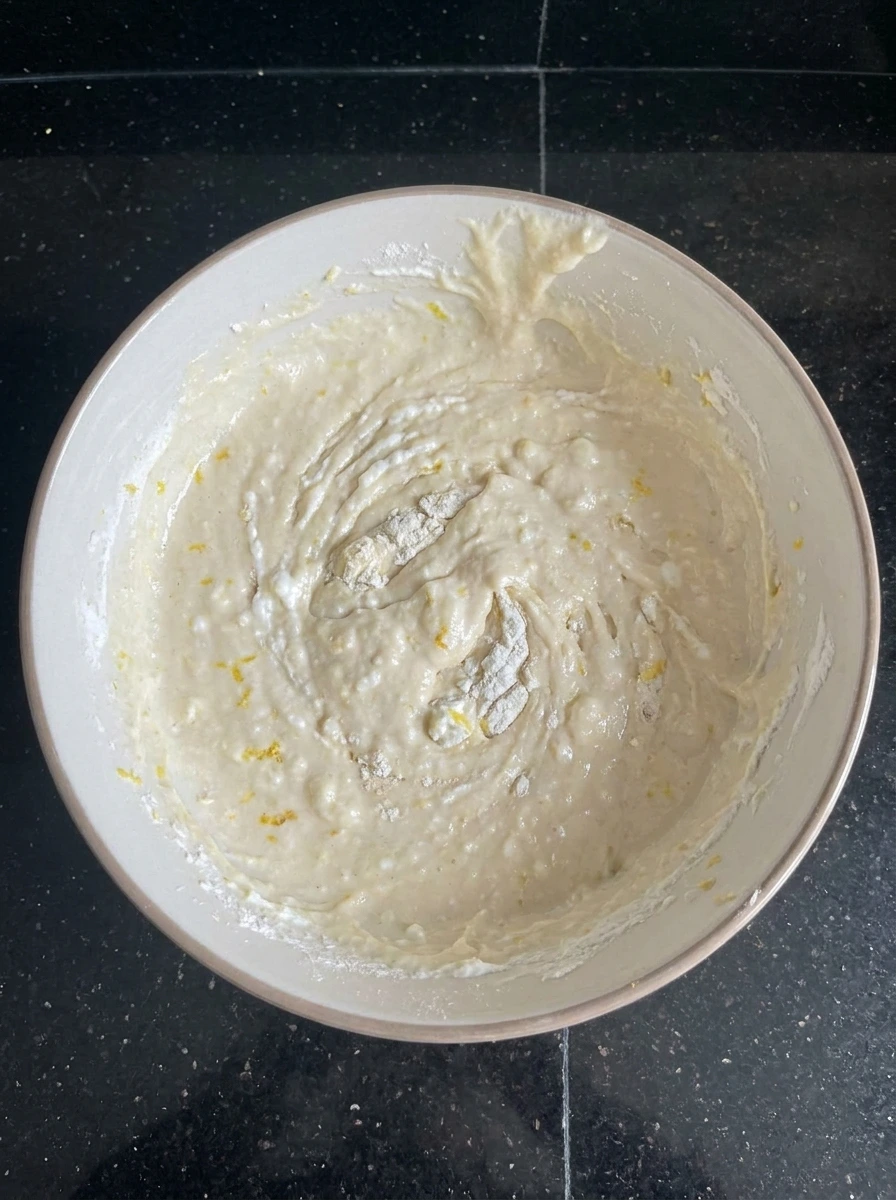 Mixing Lemon Raspberry Ricotta Pancake batter