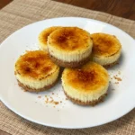 Mini Creme Brulee Cheesecakes with caramelized sugar topping.