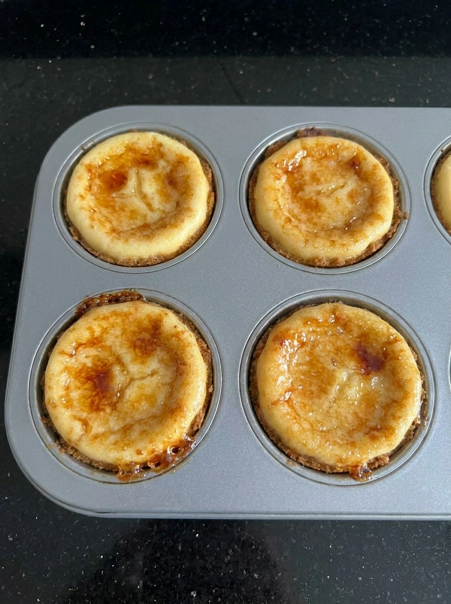 Mini cheesecakes with crisp caramelized sugar topping.