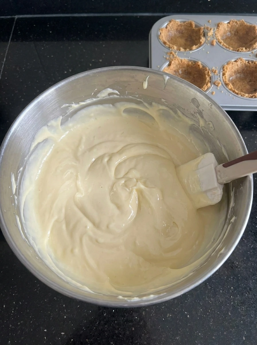 Creamy cheesecake filling mixed until smooth.