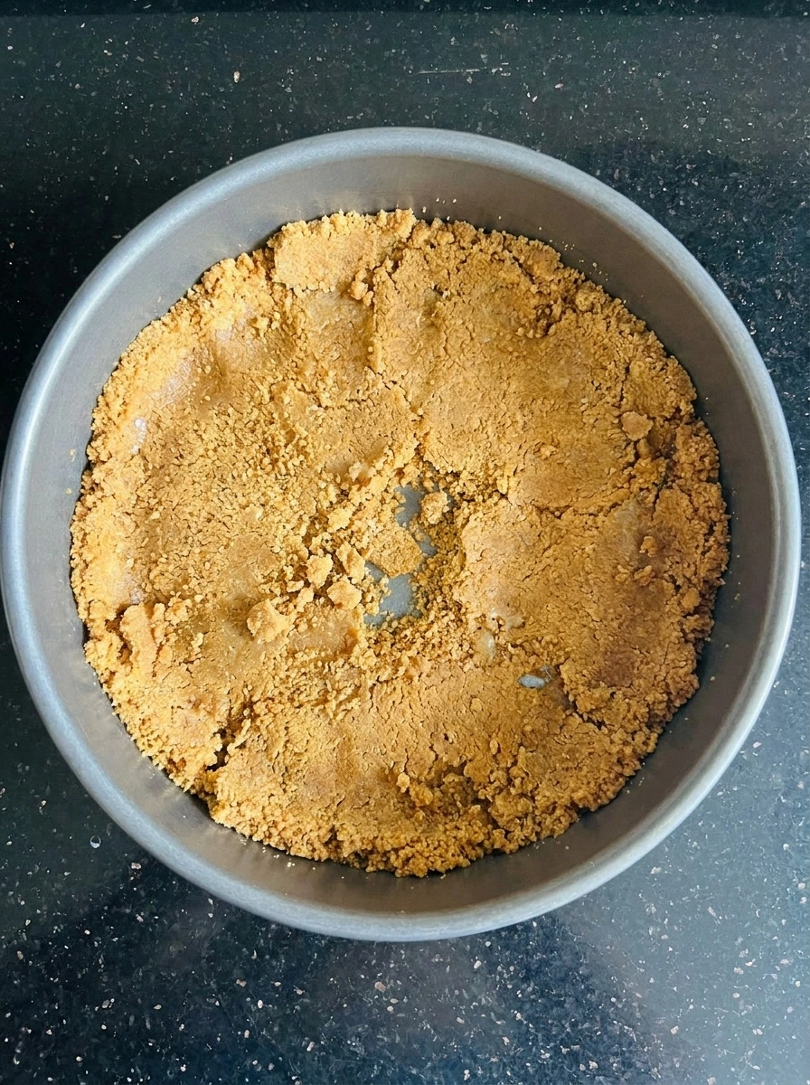 Graham crust pressed into pan uneven texture