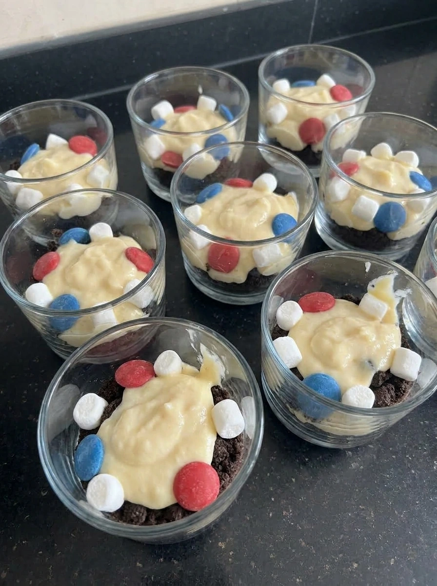 Layered Red White and Blue Dirt Cups in clear cups