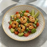 Fresh shrimp avocado salad with tomatoes and cucumbers