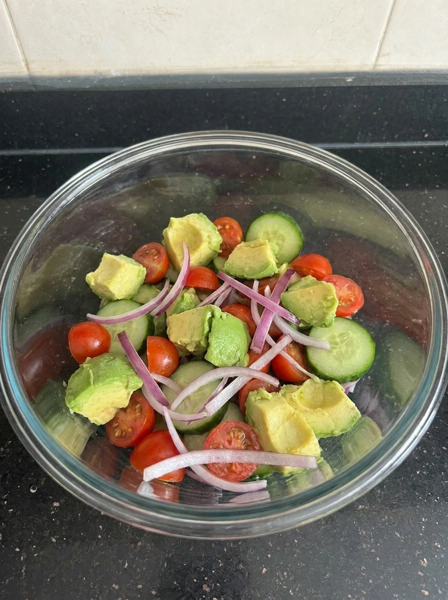 Fresh vegetables and avocado in bowl