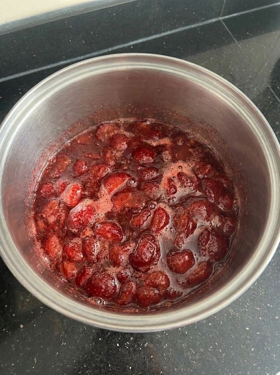 Bubbling Strawberry Jam cooking in saucepan