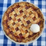 Homemade Strawberry Peach Pie with flaky crust and bubbling fruit filling
