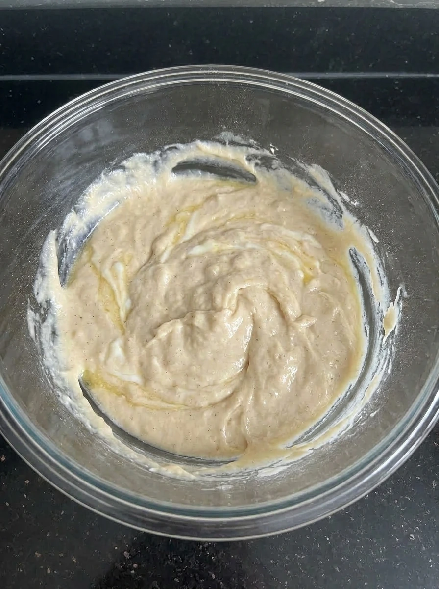 Thick batter for Bakery Style Huckleberry Muffins in a bowl