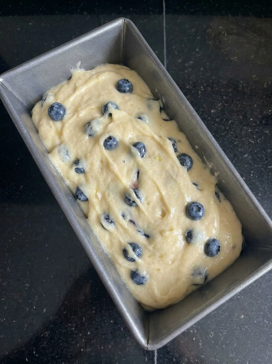Blueberry Lemon Bread batter in loaf pan