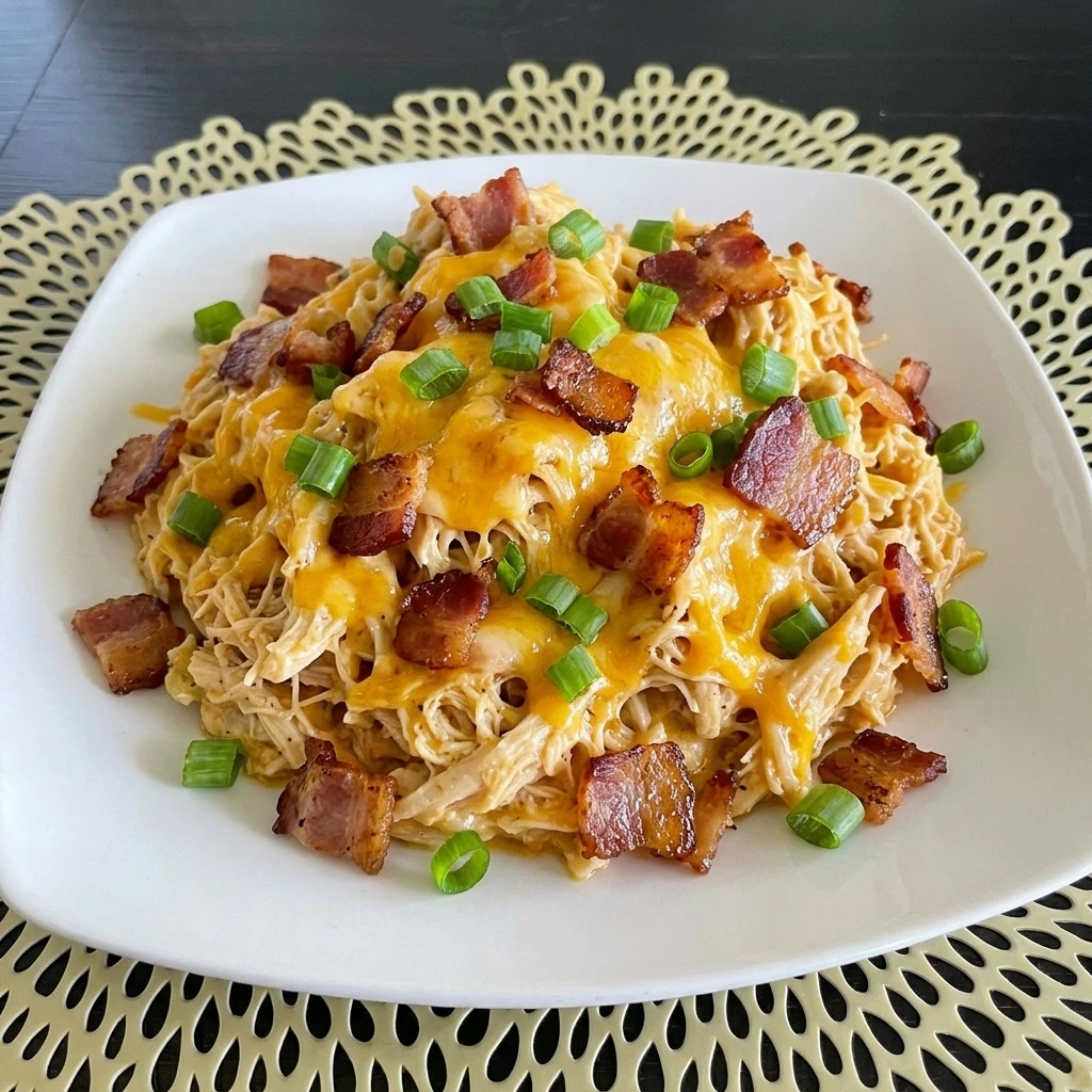 Creamy Crack Chicken with cheddar bacon and green onions