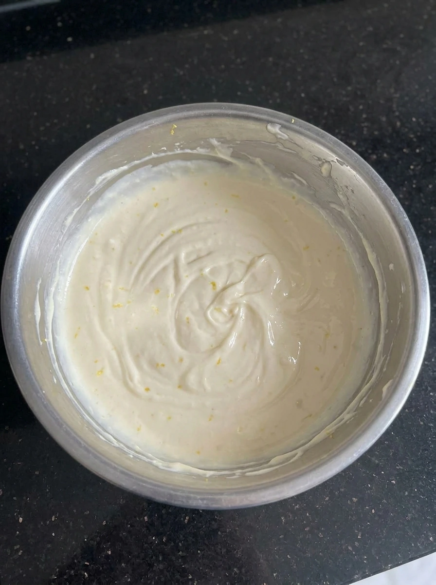 Creamy filling mixed for Creamy Huckleberry Cheesecake