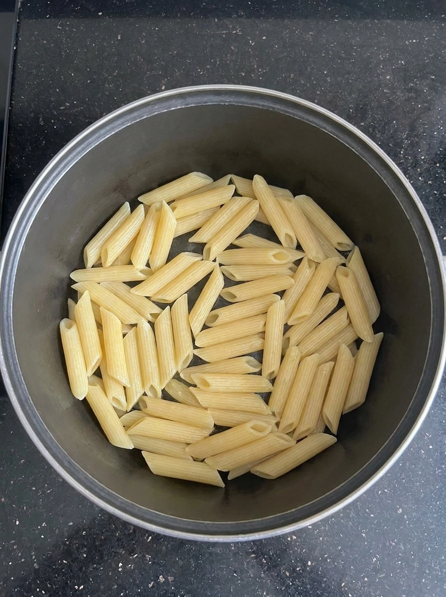 Cooked penne for Creamy Tomato Pasta