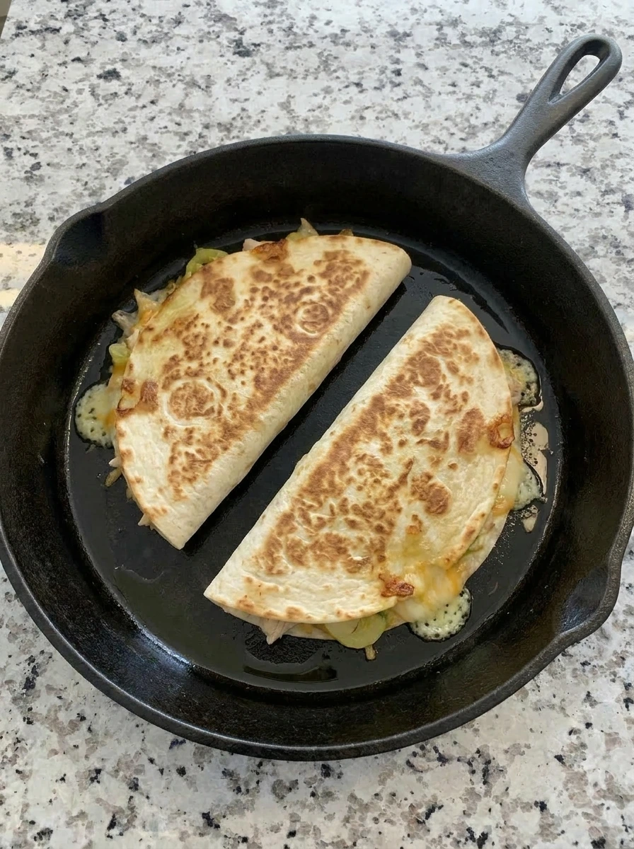 Crispy banana pepper quesadillas flipped with melted cheese