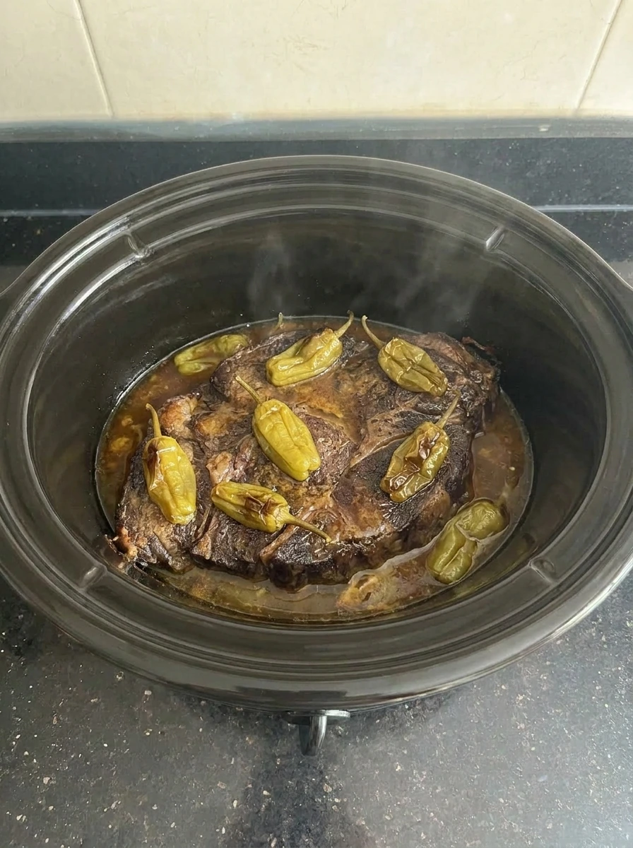 Slow cooked Crockpot Mississippi Pot Roast with tender beef and glossy sauce