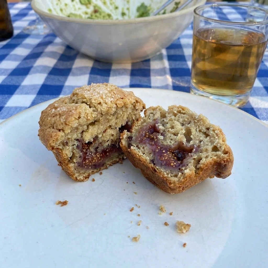Split Fresh Fig Muffin served on a white plate