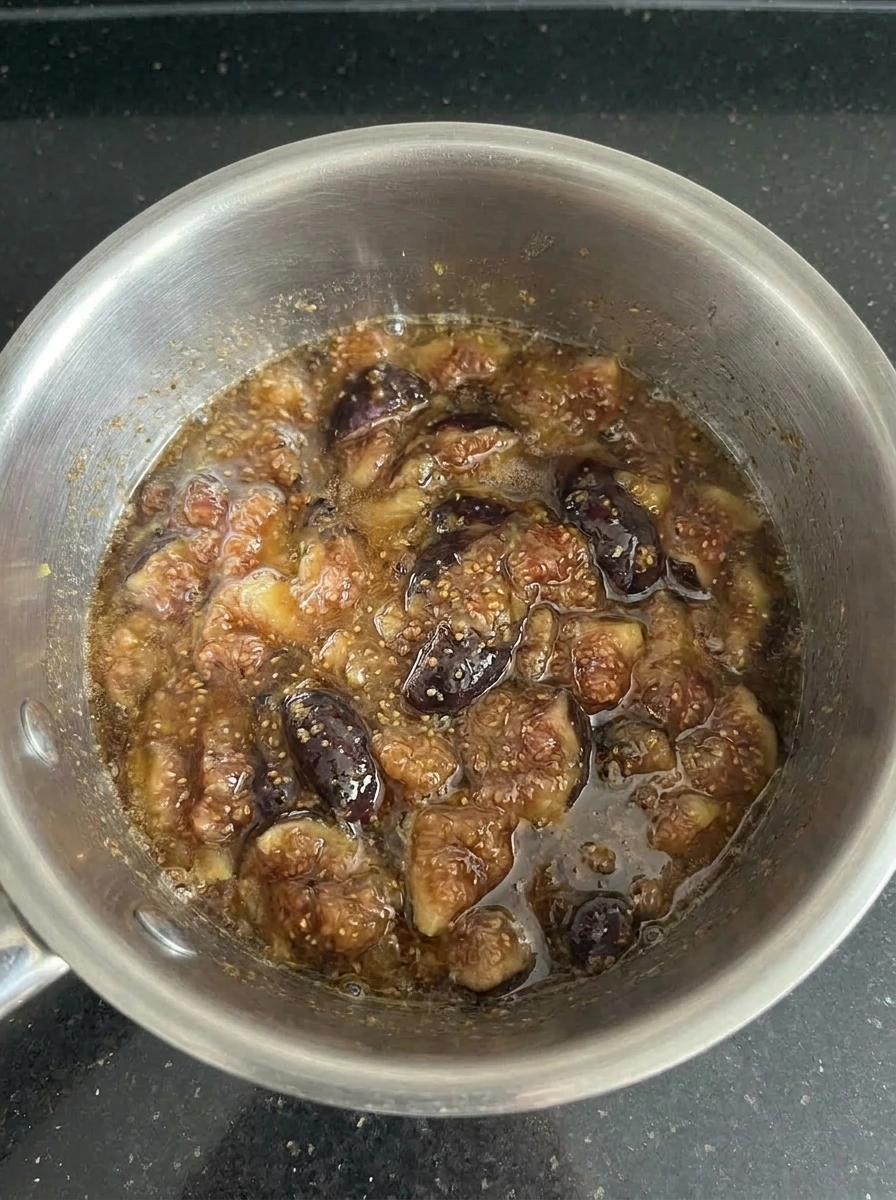 Chunky Homemade Fig Jam being mashed