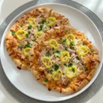 Loaded Banana Pepper Flatbread with melted cheese and tangy banana peppers