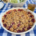 Golden Raspberry Breakfast Bars with jammy raspberry filling in a baking dish