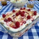 Raspberry Icebox Cake with creamy layers and fresh raspberries