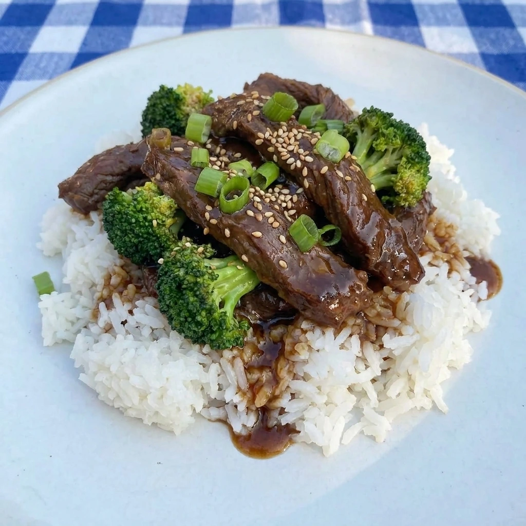Single serving of Slow Cooker Beef and Broccoli over rice