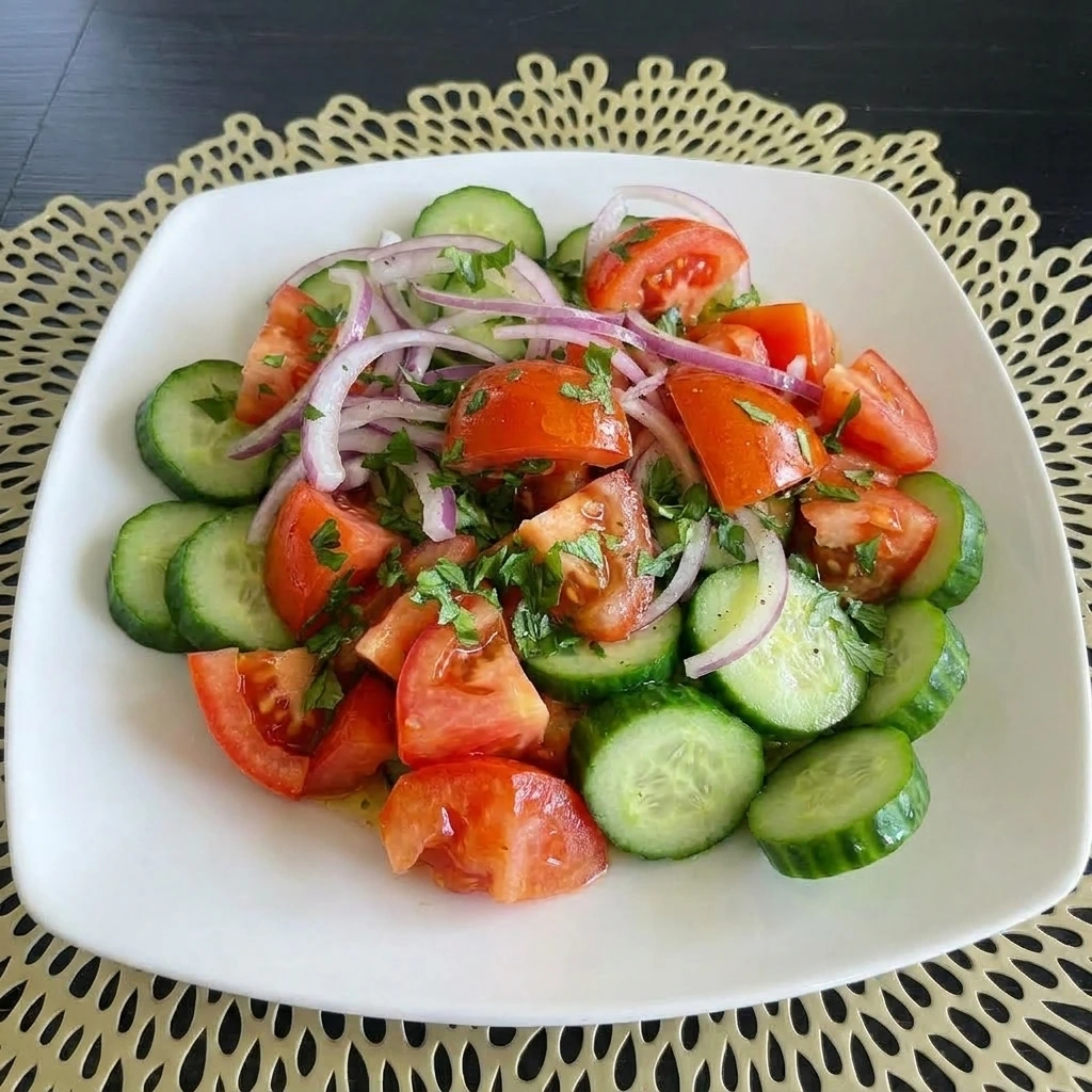 Fresh Tomato Cucumber Salad with cucumbers onions and parsley