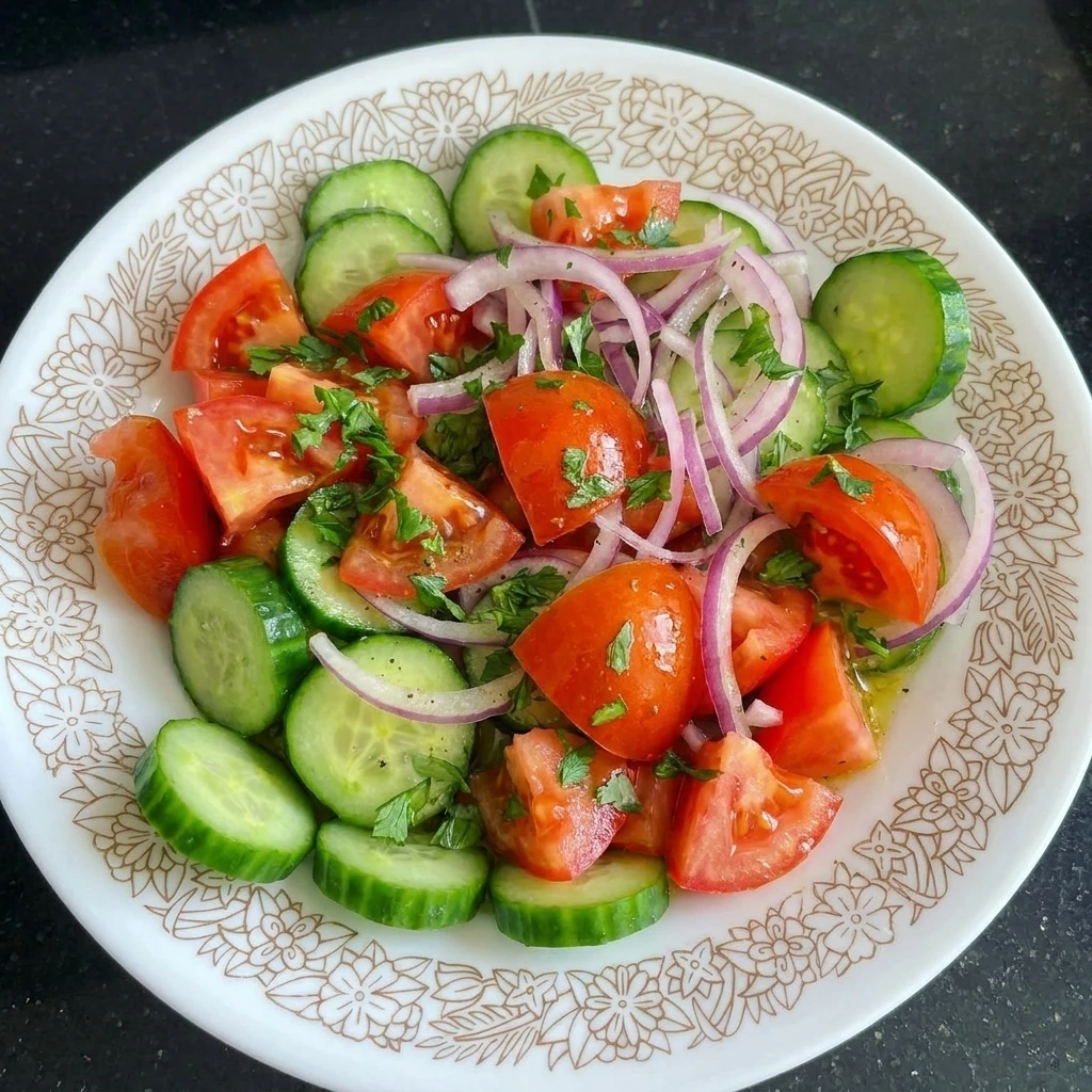 Plated Tomato Cucumber Salad portion