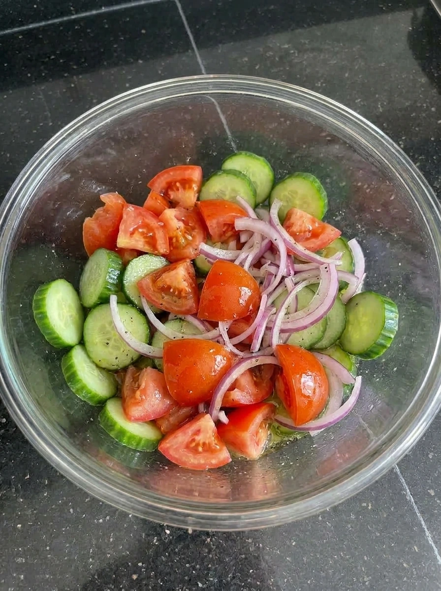 Tossed Tomato Cucumber Salad in bowl