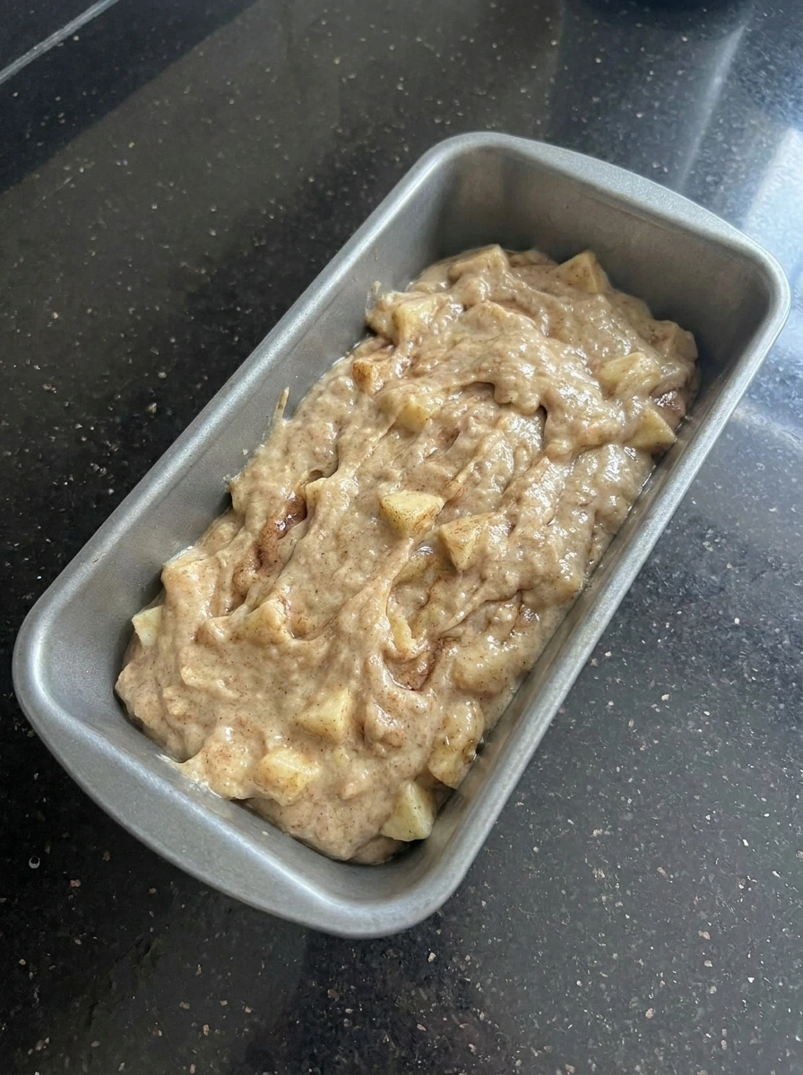 Apple Cinnamon Bread batter in loaf pan