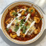 Beef Enchilada Tortellini with melted cheese and saucy beef.